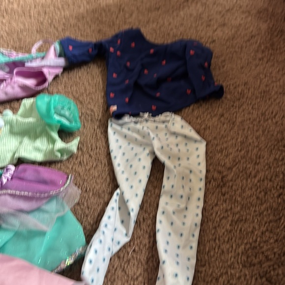 American girl dolls with some clothes and shoes and other items. - Picture 6 of 9
